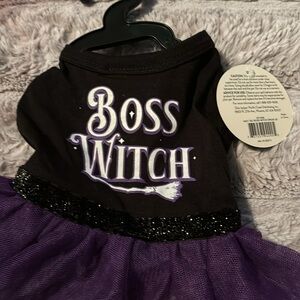 Variety of xsmall dog clothes multiple items with tags